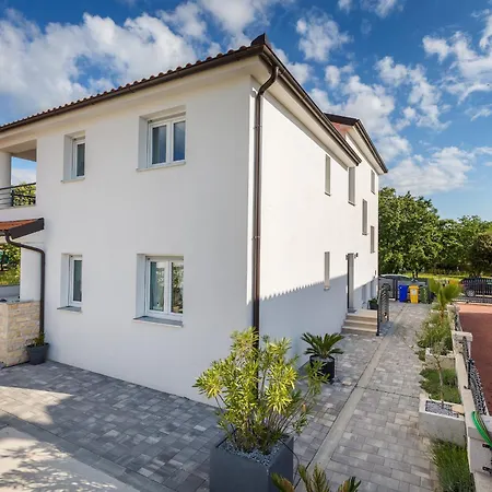 In Barbariga-apartment 3 Апартаменты